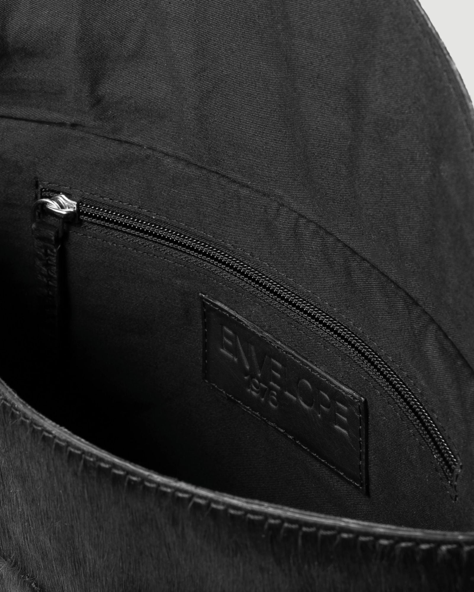 Onyx Cow Hide Clutch Black